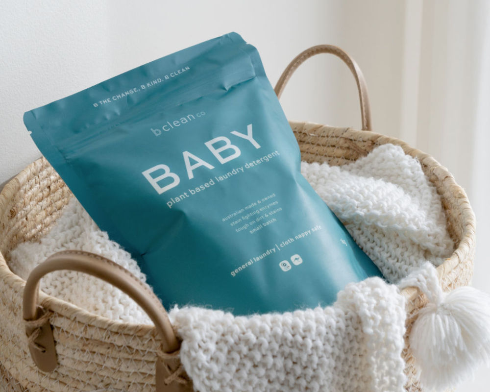 b clean co baby detergent in washing basket